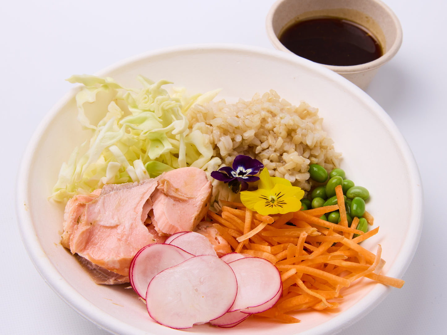 Poke bowl - Sesame crusted salmon with edamame, carrot, cabbage, radish and seasoned rice